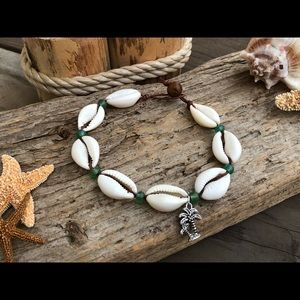 All natural cowrie shell anklet with Bali charm